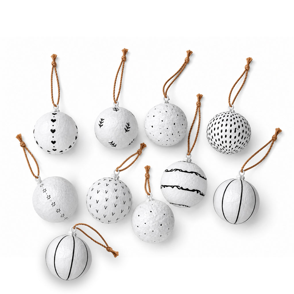 Set of handmade Scandinavian paper mache Christmas baubles with black and white patterns