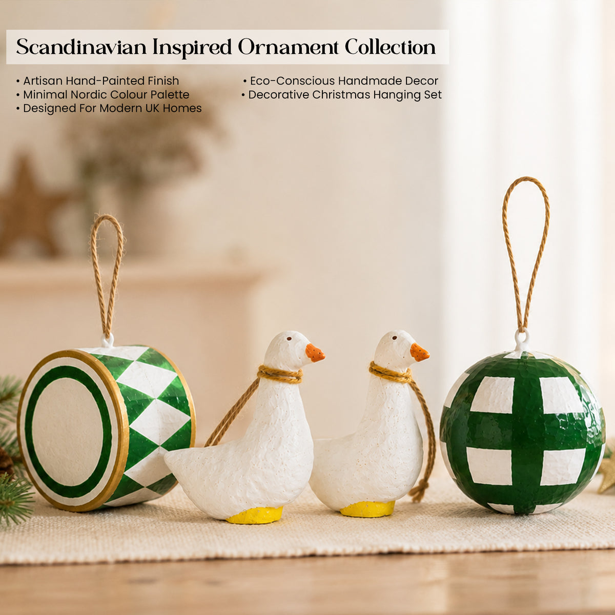 Scandinavian inspired handmade Christmas ornament collection with goose figurines drum and bauble in green and white artisan finish