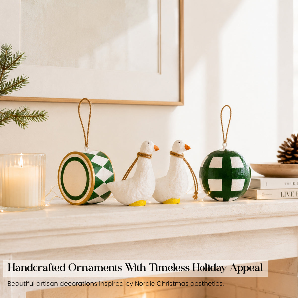 Handmade paper mache goose figurines green drum and bauble Christmas ornament set styled on white fireplace mantelpiece with candle
