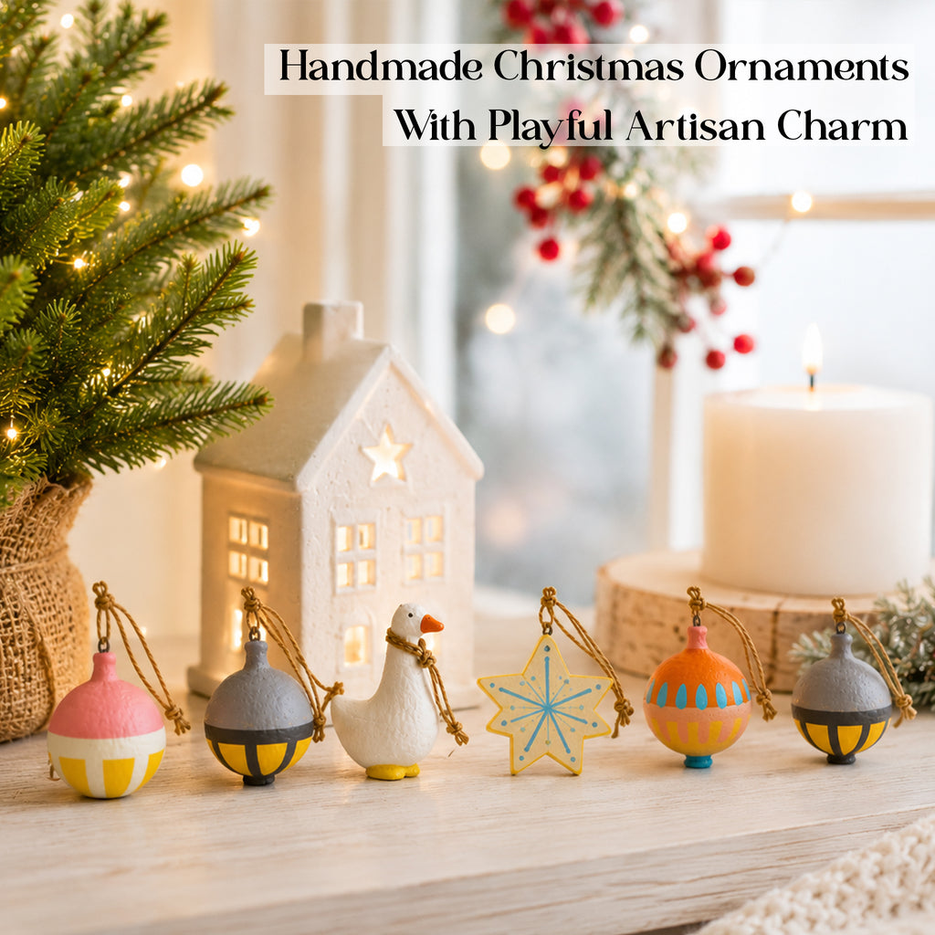 Handmade Christmas ornaments with playful artisan charm – goose figurine, star and folk art baubles displayed on wooden shelf, Aala India UK