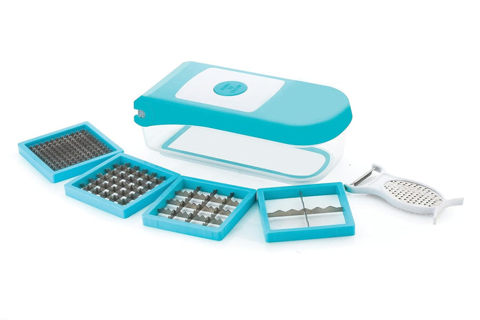 Vegetable dicer on white: aqua lid, clear container, four blade inserts and a white peeler-grater
