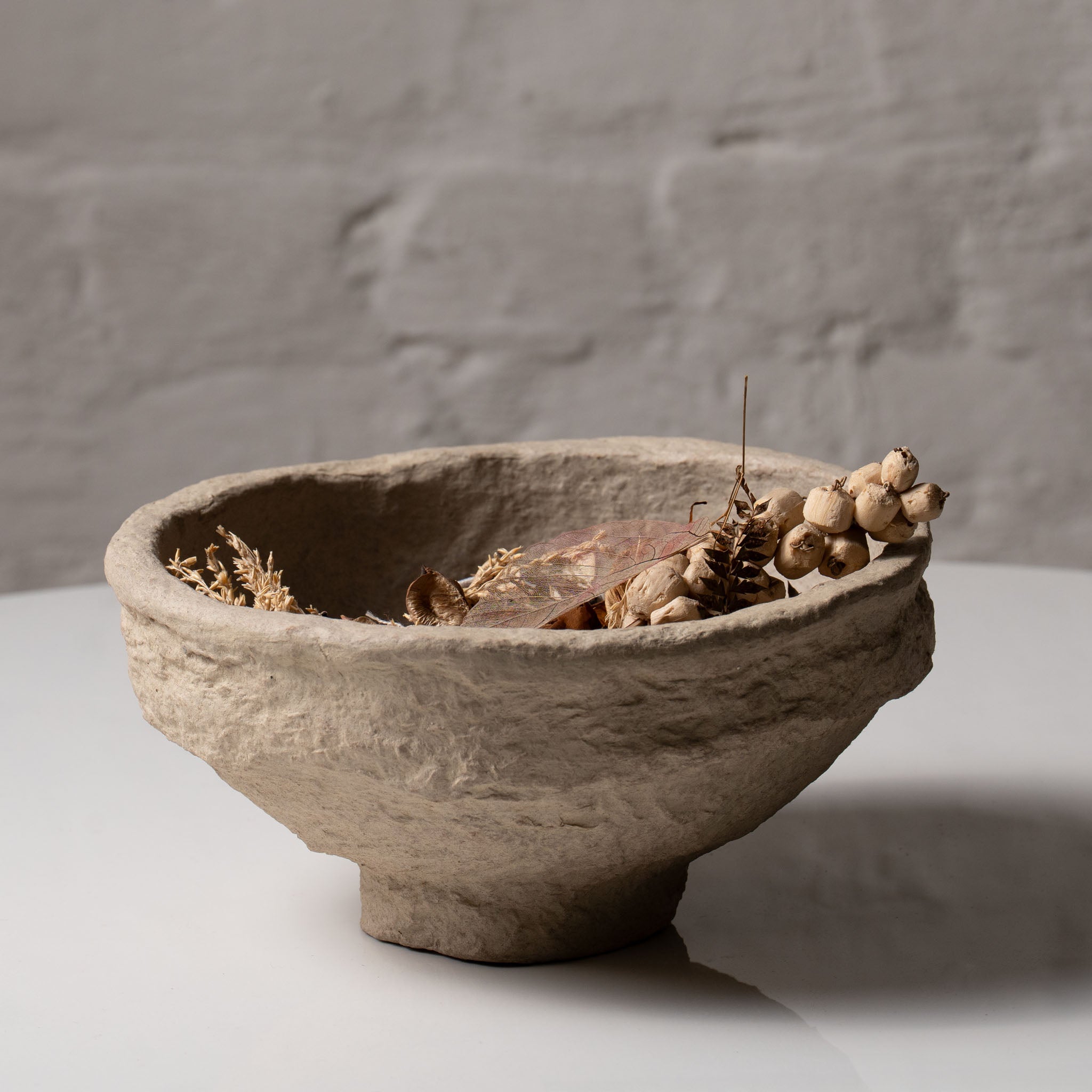 Handmade paper mâché decorative bowl with natural textured finish by AALA India