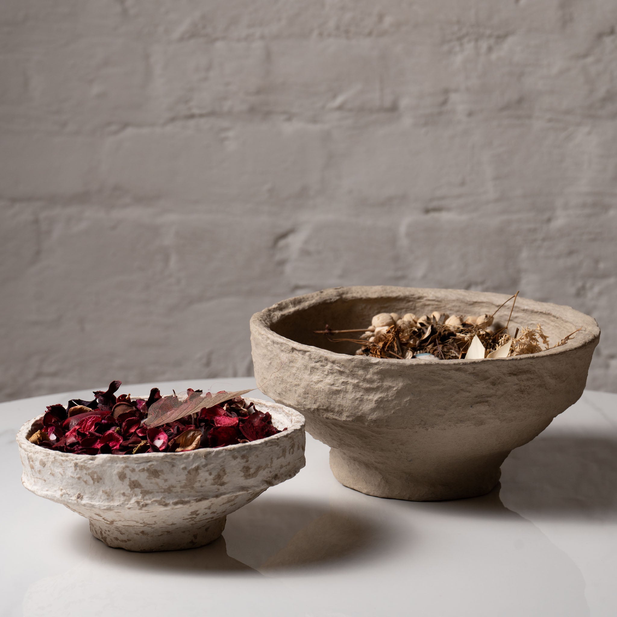Textured paper mache pedestal bowl for modern home decor